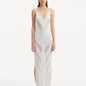 Front View: Model in Mimi White Dress - MOEVA Luxury Swimwear, Mesh Knit, Scoop Neckline, Ankle Length, MOEVA Luxury Swimwear