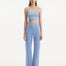 "Model wearing the Moira Baby Blue Pants from the front, showcasing the high-waisted design and wide-leg silhouette. "