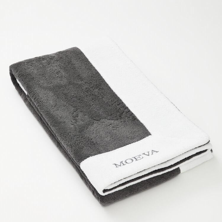 Monaco Dark Grey/White Towel | Moeva | Towel | Each week unveils new pieces—luxury swimwear, fluid resort silhouettes, and elevated summer-to-evening essentials designed to carry you from coastal escapes to city nights.