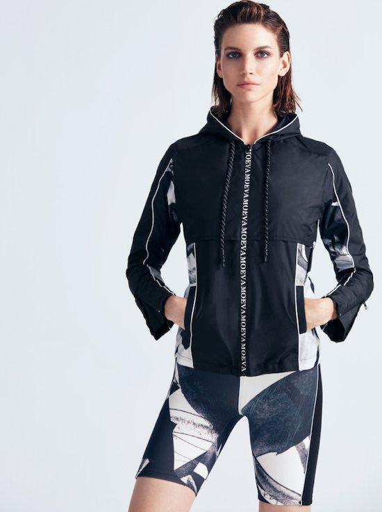 "Front view of the Morgan Abstract Print/Black Jacket, featuring a hood, bold abstract print, and black detailing."