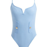 Artistic depiction of the Muriel Baby Blue Swimsuit, highlighting its graceful V-shape detail, elegant shell button accents, and luxurious Italian fabric in a beautifully stylized composition.