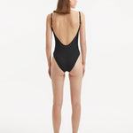 Back view of the Muriel Black Swimsuit, demonstrating the adjustable straps and overall fit.