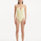 Model showcasing the Muriel Yellow Swimsuit with a vibrant V-shape detail, emphasizing its flattering and eye-catching design.