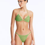 Front View: Model Wearing Nash Green Bikini Bottom - Low Waist Briefs, Chic Style, %100 Handmade Macrame, Adjustable Straps, MOEVA Luxury Swimwear