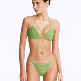 Front View: Model Wearing Nash Green Bikini Bottom - Low Waist Briefs, Chic Style, %100 Handmade Macrame, Adjustable Straps, MOEVA Luxury Swimwear