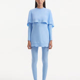 Model wearing the Nasima Baby Blue Burkini, showcasing its elegant pull-over design and modest coverage.