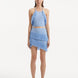 "Model wearing the Nebula Baby Blue Top and Arlo Skirt from the front, highlighting the intricate knitting patterns, refreshing baby blue color, and versatile tie-neck detail."