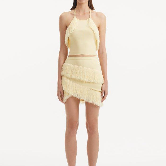 Nebula Yellow Fringe Detail Halter Knit Top | Moeva | Crop Top | Each week unveils new pieces—luxury swimwear, fluid resort silhouettes, and elevated summer-to-evening essentials designed to carry you from coastal escapes to city nights.