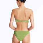 Back View: Model Wearing Nixie Green Bikini Set - Mid Rise, Hipster Style, Fully Lined, Italian Fabric, Movable Accessories, MOEVA Luxury Swimwear