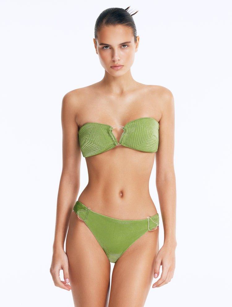 Front View: Model in Nixie Green Bikini Set - Classic Briefs, Chic Style, Metallic Fabric, Clear Glass Drop Shaped Accessories, MOEVA Luxury Swimwear