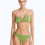 Front View: Model in Nixie Green Bikini Set - Classic Briefs, Chic Style, Metallic Fabric, Clear Glass Drop Shaped Accessories, MOEVA Luxury Swimwear