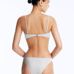Back View: Nixie Silver Bikini Top on Model - Stylish Two-Piece Swimsuit Top, Golden Clasps at the Back, Removable and Adjustable Straps, Fully Lined, MOEVA Luxury Swimwear