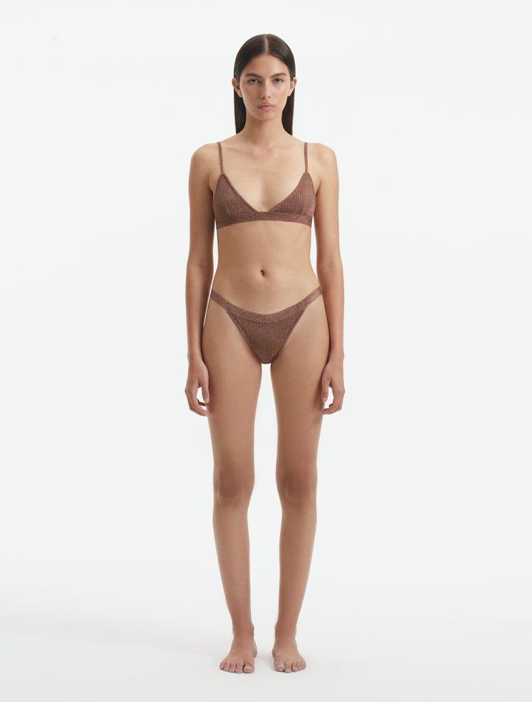 Front View: Model in North Brown Bikini Bottom - MOEVA Luxury Swimwear, Low Waist, Small Bottom Coverage, Knitted, MOEVA Luxury Swimwear