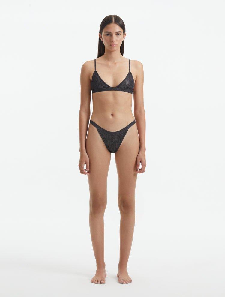 Front View: Model in North Silver Bikini Bottom - MOEVA Luxury Swimwear, Low Waist, Small Bottom Coverage, Knitted, MOEVA Luxury Swimwear