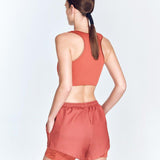 "Back view of Ondine Red Ochre Shorts showcasing the double-layered design and adjustable waistband."