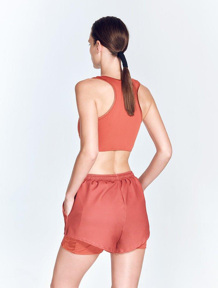 "Back view of Ondine Red Ochre Shorts showcasing the double-layered design and adjustable waistband."