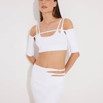 Front View: Model in Ontario White Skirt - MOEVA Luxury Swimwear, Knitted, High Rise, Thigh Length, MOEVA Luxury Swimwear