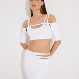 Front View: Model in Ontario White Skirt - MOEVA Luxury Swimwear, Knitted, High Rise, Thigh Length, MOEVA Luxury Swimwear