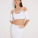 Front View: Model in Ontario White Skirt - MOEVA Luxury Swimwear, Knitted, High Rise, Thigh Length, MOEVA Luxury Swimwear