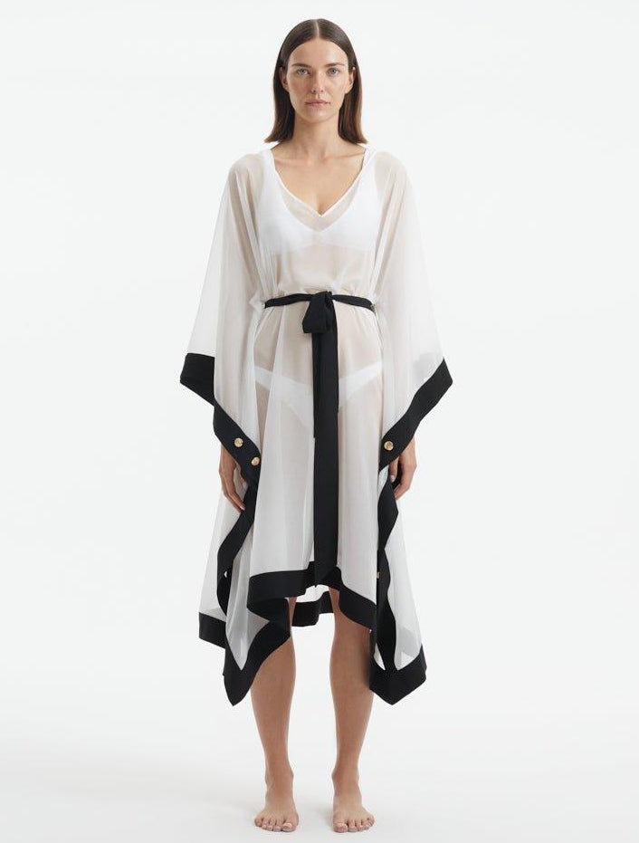Opal White-Black Sheer Gold Buttoned Belted Kaftan | Moeva | Kaftan | Each week unveils new pieces—luxury swimwear, fluid resort silhouettes, and elevated summer-to-evening essentials designed to carry you from coastal escapes to city nights.