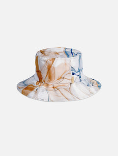 Front View: Orlando Blue Abstract Kids Bucket Hat - Swimwear Fabric Bucket Hat, Signature Moeva Patch at Front, Classic Sillhouette, Quilted Brim, Quick Dry, Lined, MOEVA Luxury Swimwear 