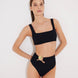 Front View: Model in Patrizia Black Bikini Set- MOEVA Luxury Swimwear, Square Neck, Removable Padding, Lined MOEVA Luxury Swimwear  