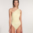 "Model wearing the Penny Yellow Swimsuit from the front, highlighting its one-shoulder design and flattering ruching details on the cups and waist for a cinched-in hourglass silhouette."