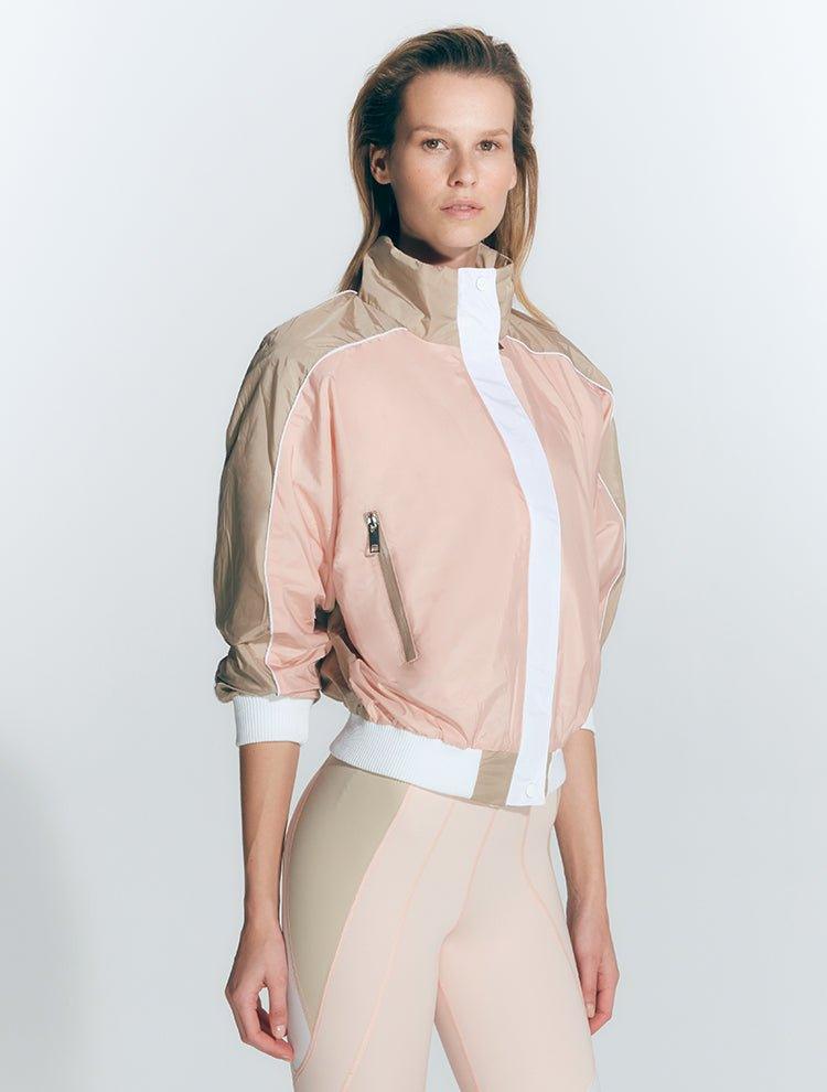 Pixie Pink/Nude/White Jacket | Moeva | Activewear | Each week unveils new pieces—luxury swimwear, fluid resort silhouettes, and elevated summer-to-evening essentials designed to carry you from coastal escapes to city nights.