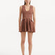 "Model wearing the Rayan Brown Dress from the front, showcasing the premium knitted fabric, the rich brown hue, and the shell-shaped gold buttons."