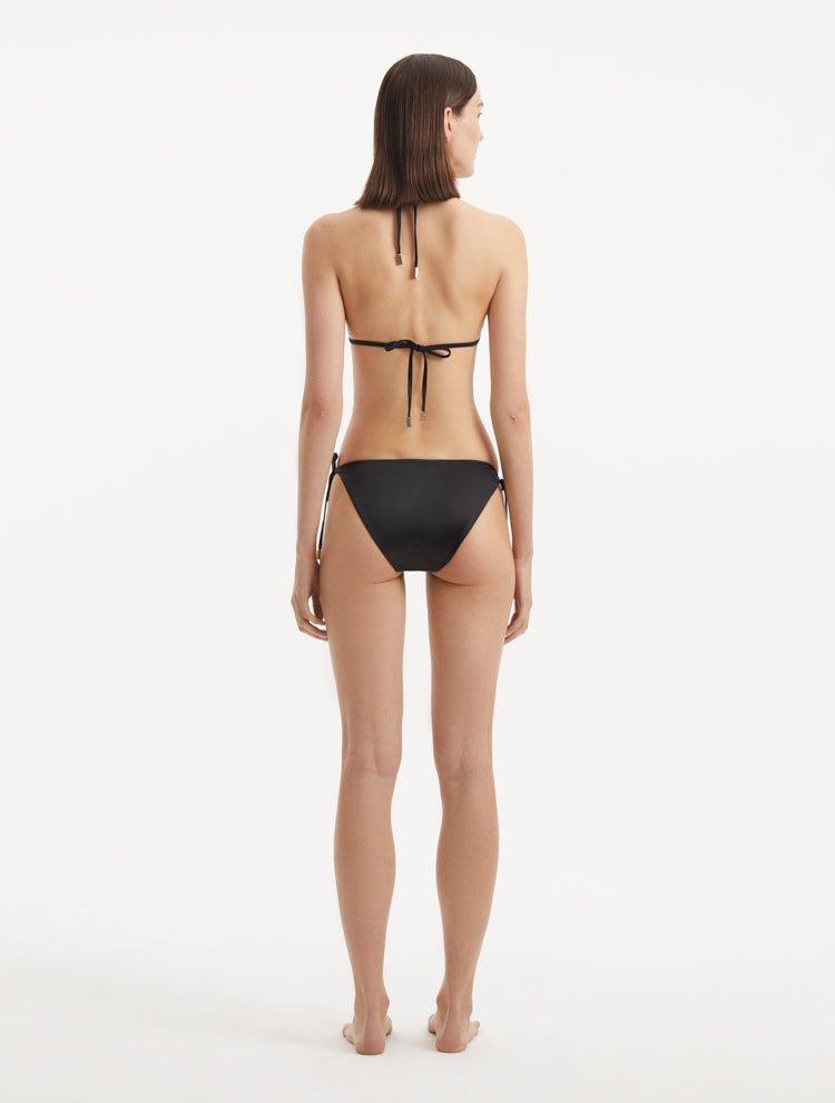 Laura Badura - Rhea Black Triangle Side Tie Satin Bikini Set | Moeva | | Each week unveils new pieces—luxury swimwear, fluid resort silhouettes, and elevated summer-to-evening essentials designed to carry you from coastal escapes to city nights.