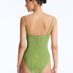 Back View: Rhodes Green Swimsuit on Model - Moderate Bottom Coverage, Zip Back Fastening, Italian Fabric, MOEVA Luxury Swimwear