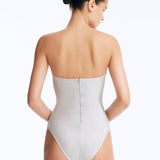 Back View: Rhodes Silver Swimsuit on Model - Moderate Bottom Coverage, Zip Back Fastening, Italian Fabric, MOEVA Luxury Swimwear