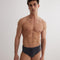 Ricardo Grey/Green/White Blue Quick Dry Swim Briefs with Drawcord | Moeva | Briefs | Each week unveils new pieces—luxury swimwear, fluid resort silhouettes, and elevated summer-to-evening essentials designed to carry you from coastal escapes to city nights.