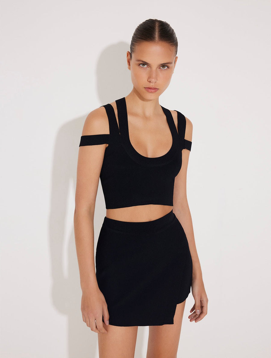 Front View: Model in Rila Black Top - Cropped Top, Unlined, Scoop Neck, Ribbed Details Seam, MOEVA Luxury Swimwear