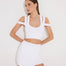 Front View: Model in Rila White Top - Cropped Top, Unlined, Scoop Neck, Ribbed Details Seam, MOEVA Luxury Swimwear