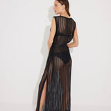 Back View: Model in Roma Black Dress - MOEVA Luxury Swimwear, High Neck Luxury Maxi Dress, Unlined, Comfort , Textured Fabric, MOEVA Luxury Swimwear