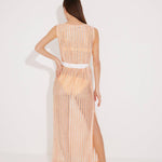 "Back view of the Roma Orange/White High-Neck Dress, highlighting its elegant high neck design, loose fit, and knee-high side slit. "