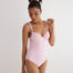 "Model wearing the Ronja Pink Swimsuit from the front, showcasing the underwired design and ABS chain straps."