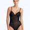 Front View: Model in Rue Black Swimsuit - Underwire, Lightly Lined, Comfortable, %100 Handmade Macrame, Removable Paddings, MOEVA Luxury Swimwear
