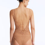 Back View: Rue Bronze Swimsuit on Model - Lace-Up Back, Clear Glass Drop Details, Moderate Bottom Coverage, Removable Paddings, Adjustable Straps, Fully Lined, MOEVA Luxury Swimwear