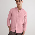 Front View: Model in Ryan Pink Shirt - MOEVA Luxury Swimwear, Grandad-Collar, Buttoned Cuffs, Button Fastening, Tailored Italian Linen, Long-Sleeved, Slim Fit, MOEVA Luxury Swimwear