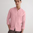 Front View: Model in Ryan Pink Shirt - MOEVA Luxury Swimwear, Grandad-Collar, Buttoned Cuffs, Button Fastening, Tailored Italian Linen, Long-Sleeved, Slim Fit, MOEVA Luxury Swimwear