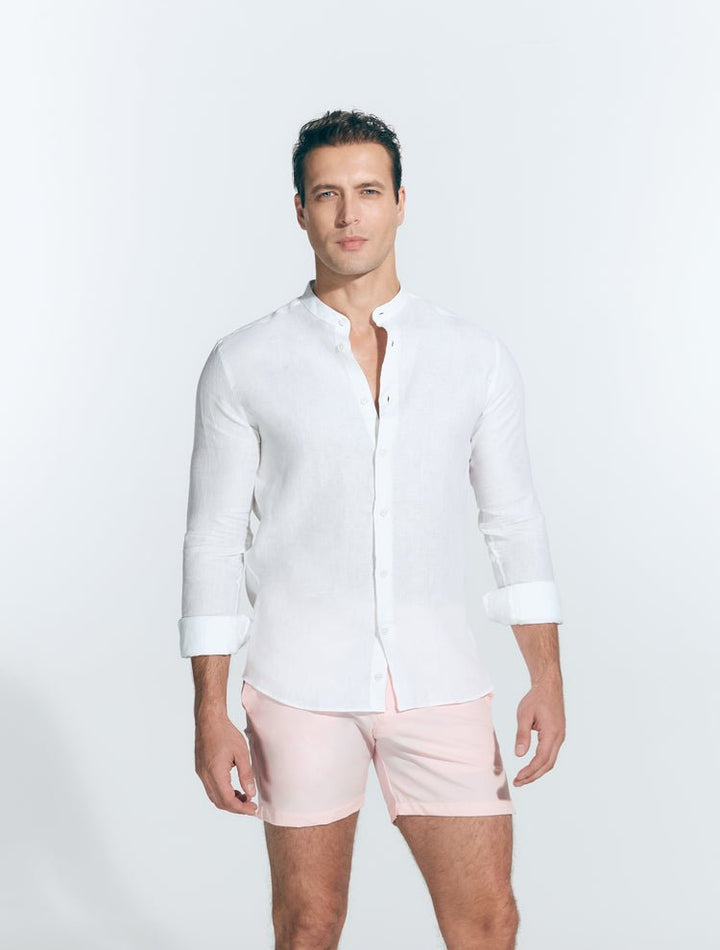Front View: Model in Ryan White Shirt - MOEVA Luxury Swimwear, Grandad-Collar, Buttoned Cuffs, Button Fastening, Tailored Italian Linen, Long-Sleeved, Slim Fit, MOEVA Luxury Swimwear
