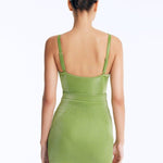 Back View: Rye Green Skirt on Model - Thigh Length, Topstitching Details, Made of Laminated Swimwear Fabric, MOEVA Luxury Swimwear