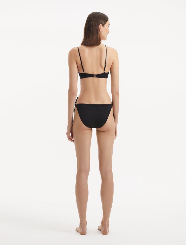 Salila Black Side Tie Wave Textured Bikini Bottom | Moeva | Bikini Bottom | Each week unveils new pieces—luxury swimwear, fluid resort silhouettes, and elevated summer-to-evening essentials designed to carry you from coastal escapes to city nights.