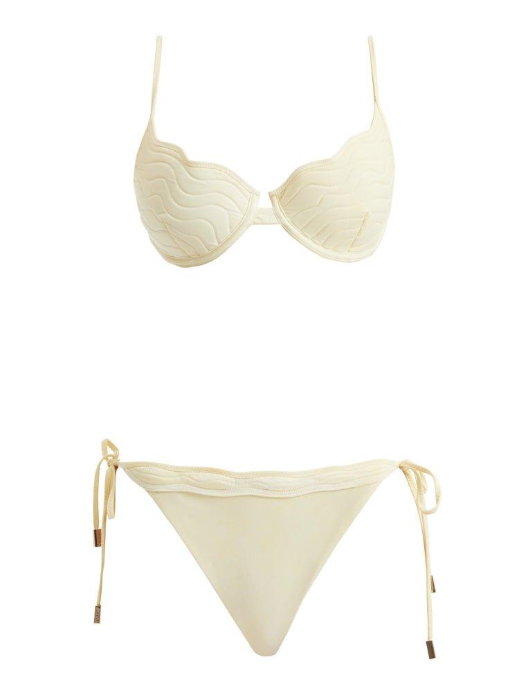 Decoupage view of the Salila Yellow Bikini Set, detailing the luxurious craftsmanship and Lycra Xtralife certification for durability.