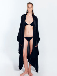 Front View: Model in Salina Black Kaftan - MOEVA Luxury Swimwear, Long Sleeved, Ankle Length, MOEVA Luxury Swimwear