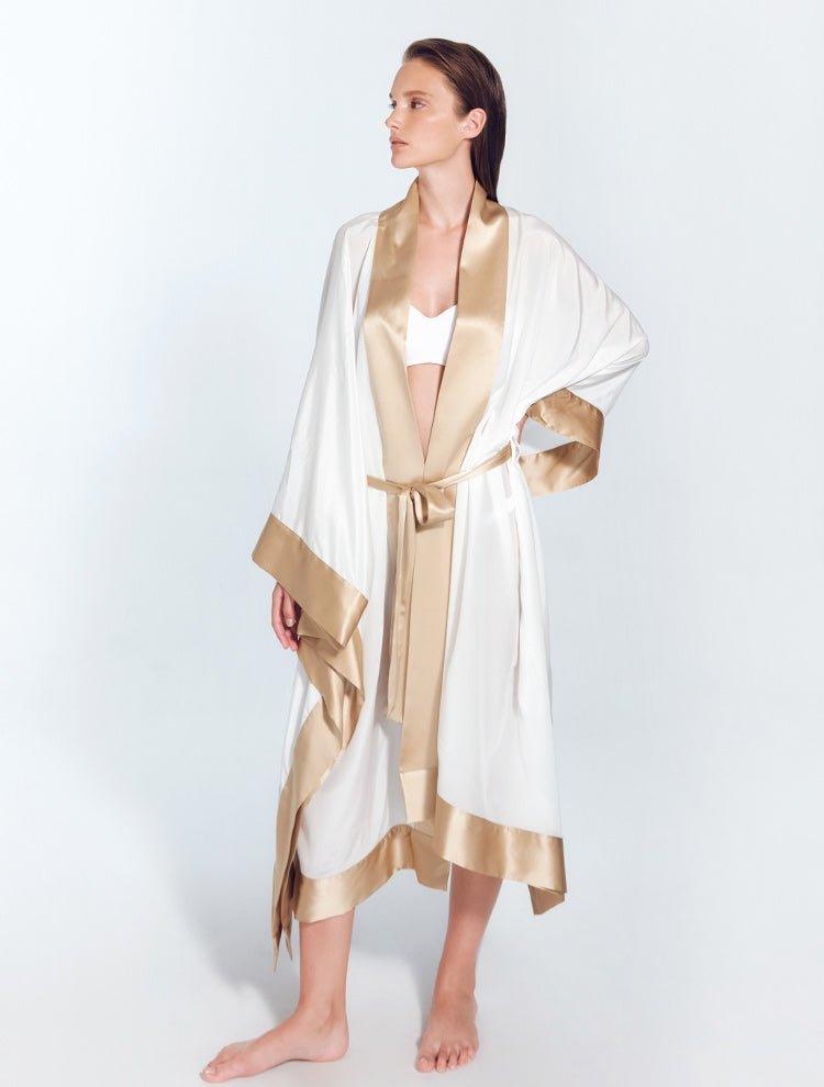 "Front view of a model in the Salina White/Nude Kaftan, showcasing its ankle-length design and elegant cut."