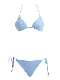 Decoupage view of the Sarita Baby Blue Bikini Set, illustrating the premium Italian fabric and Lycra Xtralife certification for durability.