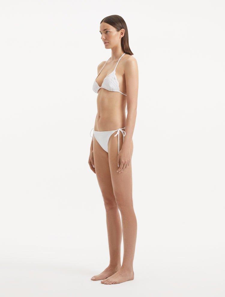 Side view highlighting the sleek silhouette and overall fit of the bikini set.